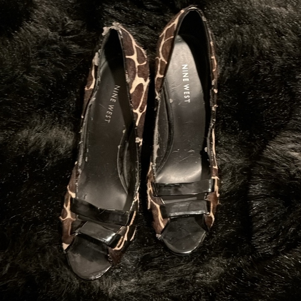 Preowned nine W. open toe heels size 8.5 US